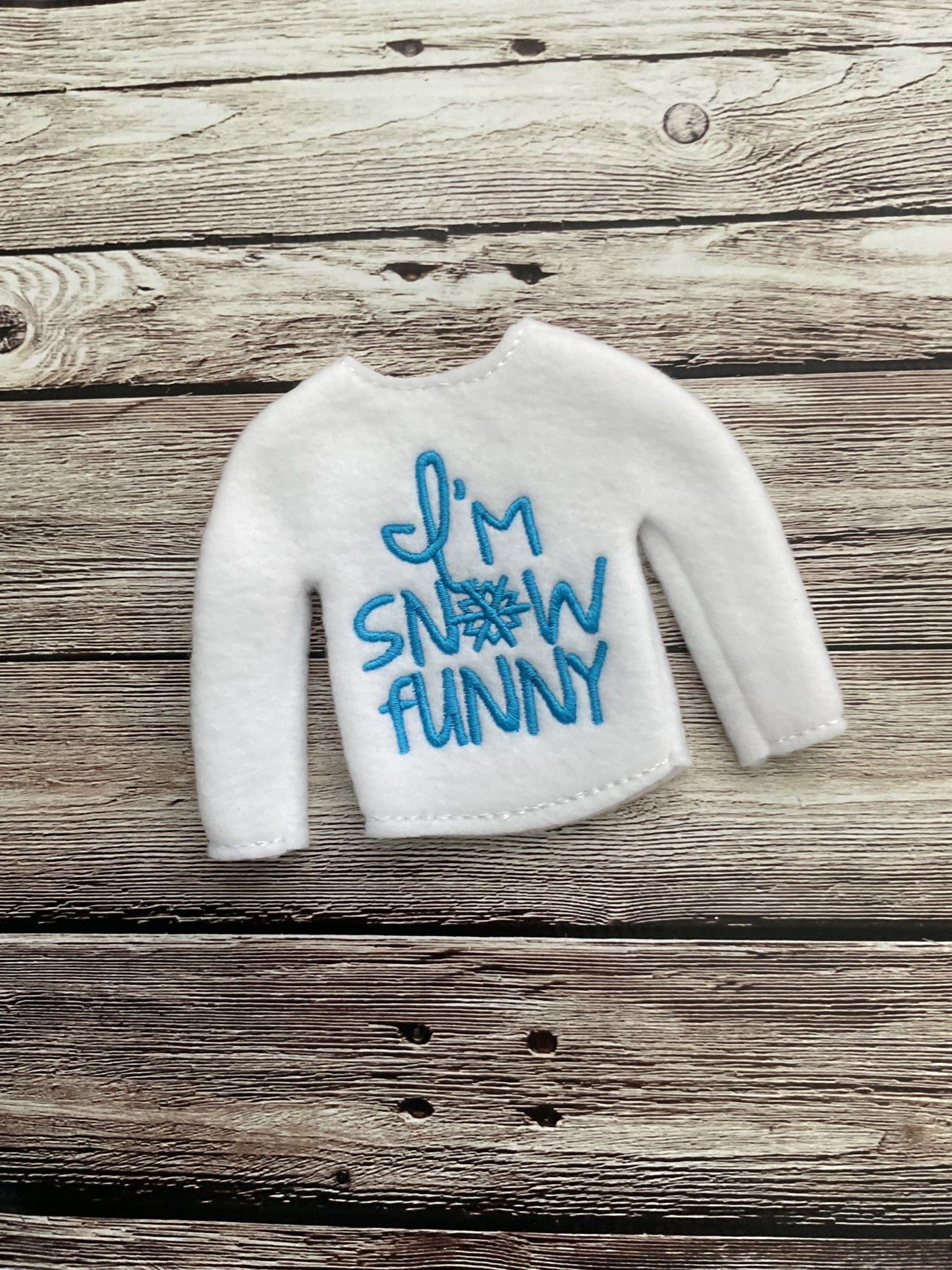 (127) Holiday Elf/Doll Sweater featuring a saying “ I’m snow Funny”