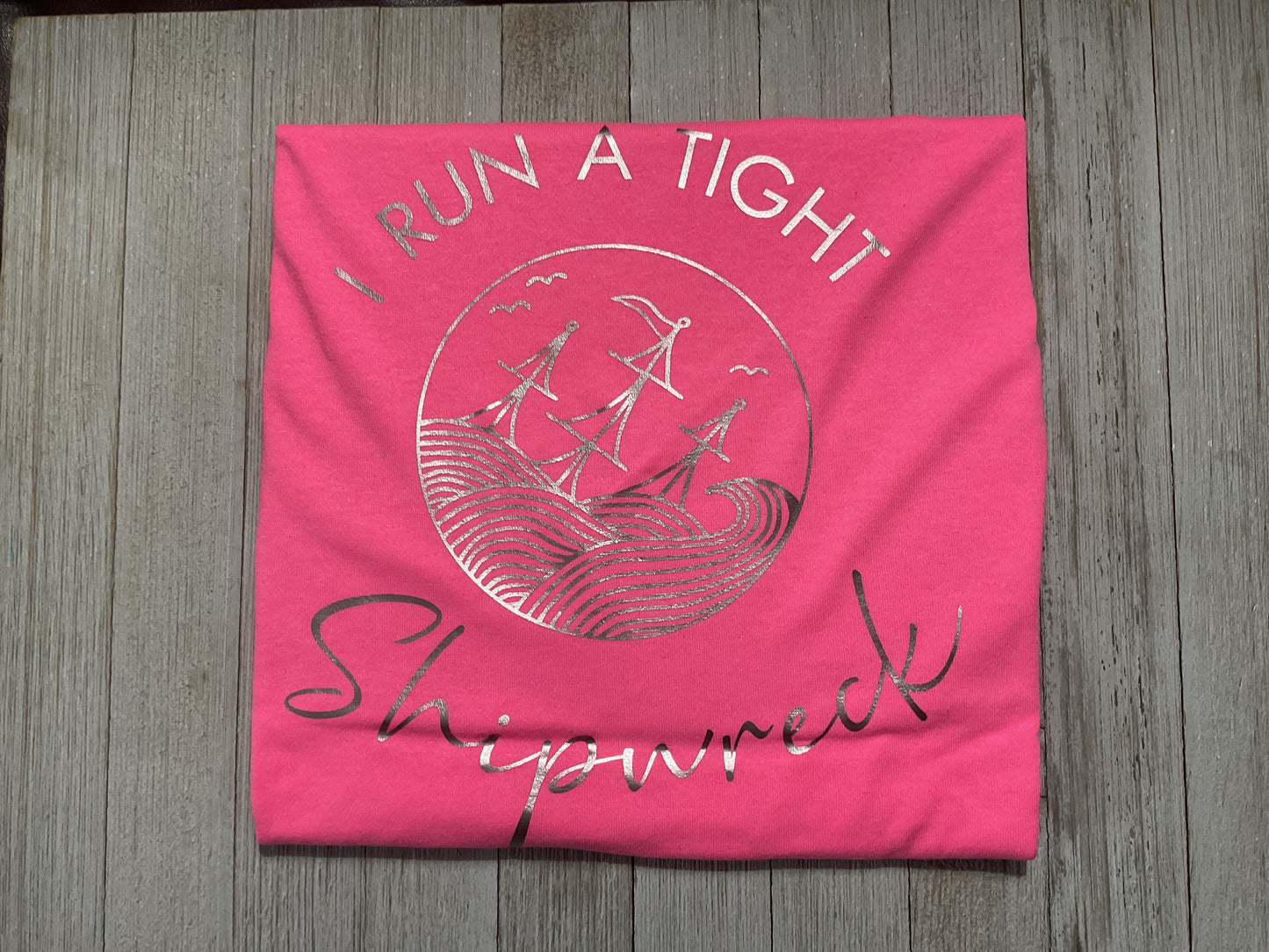 I Run A Tight Shipwreck Graphic T - Pink
