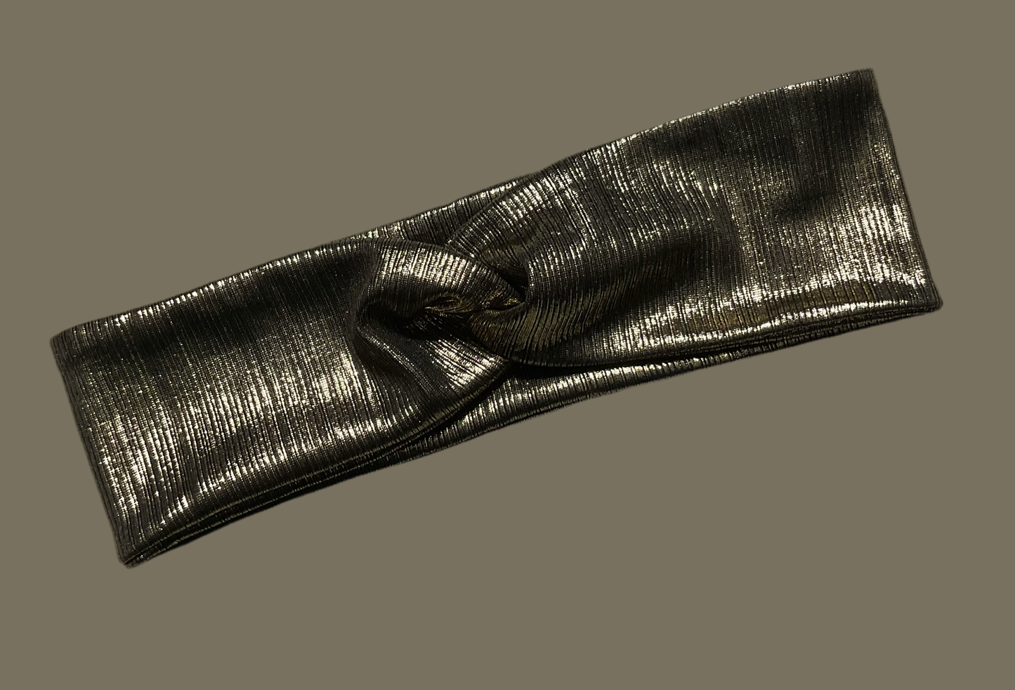 Wide twisted shiny gold headband perfect to add fashion and style to any outfit