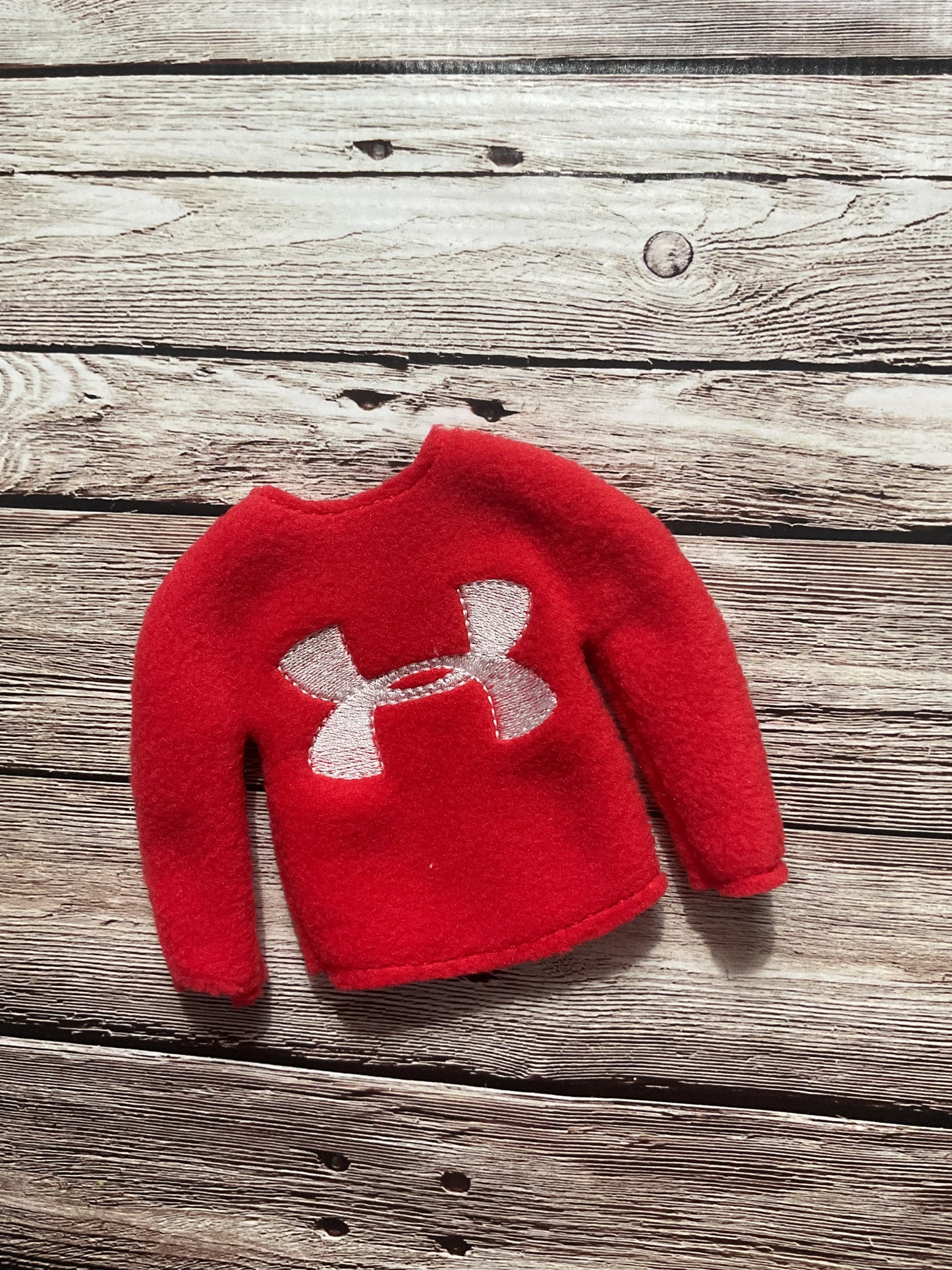 (245) Holiday Elf/Doll Sweater featuring athletic Armour