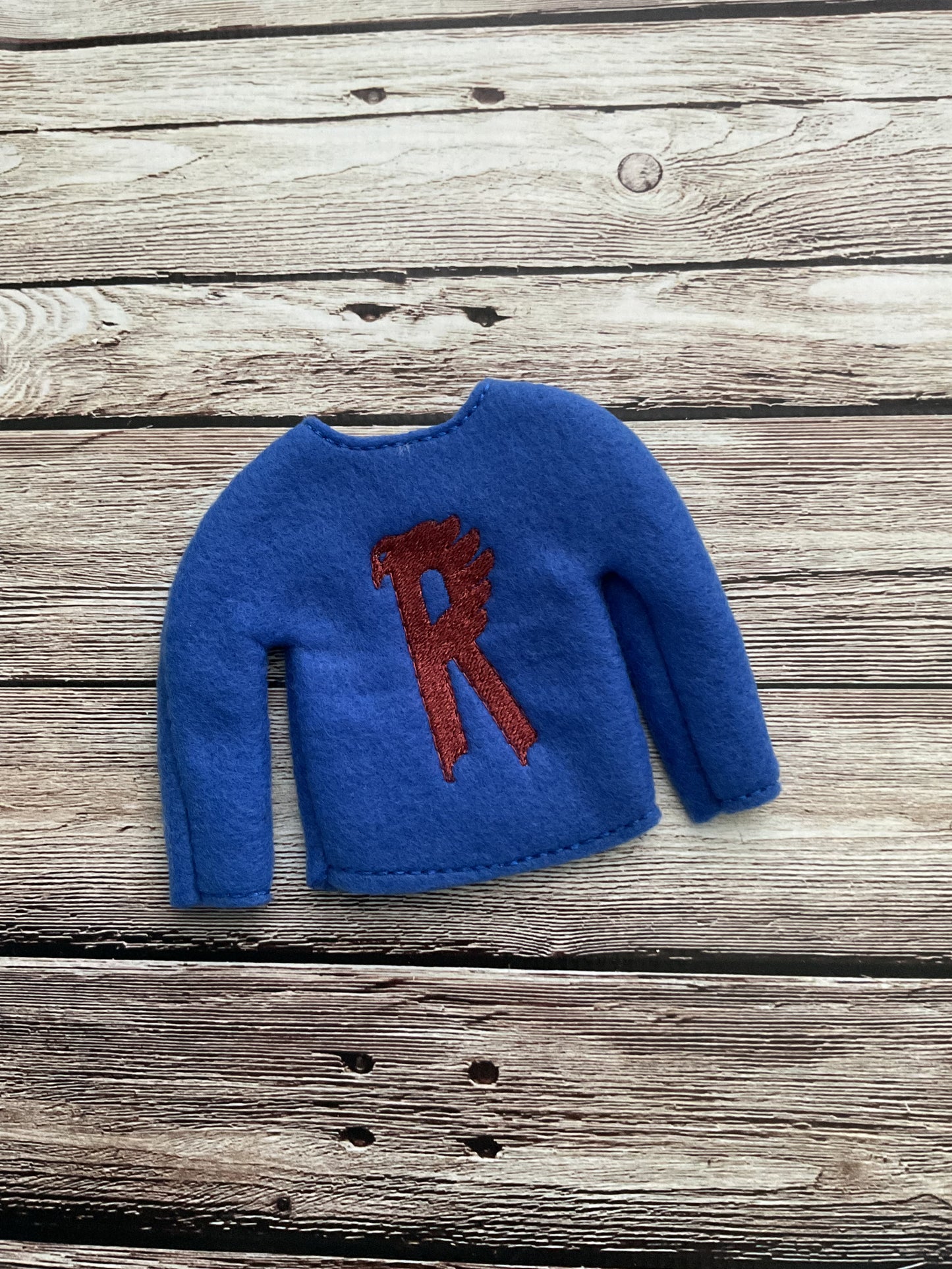 (110) Holiday Elf/Doll Sweater featuring a blue Harry Potter R