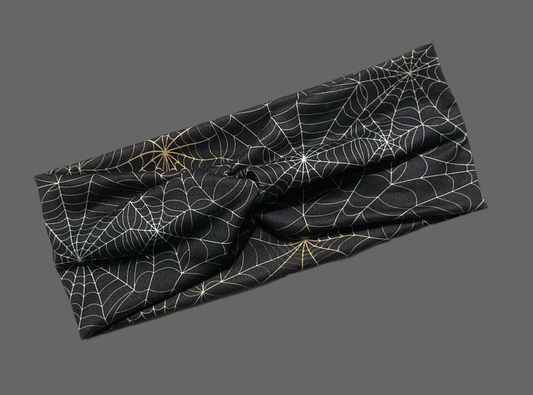 Wide twisted Halloween Spider Web headband perfect for the Halloween season, sports, yoga, workouts fun fashionable and comfortable
