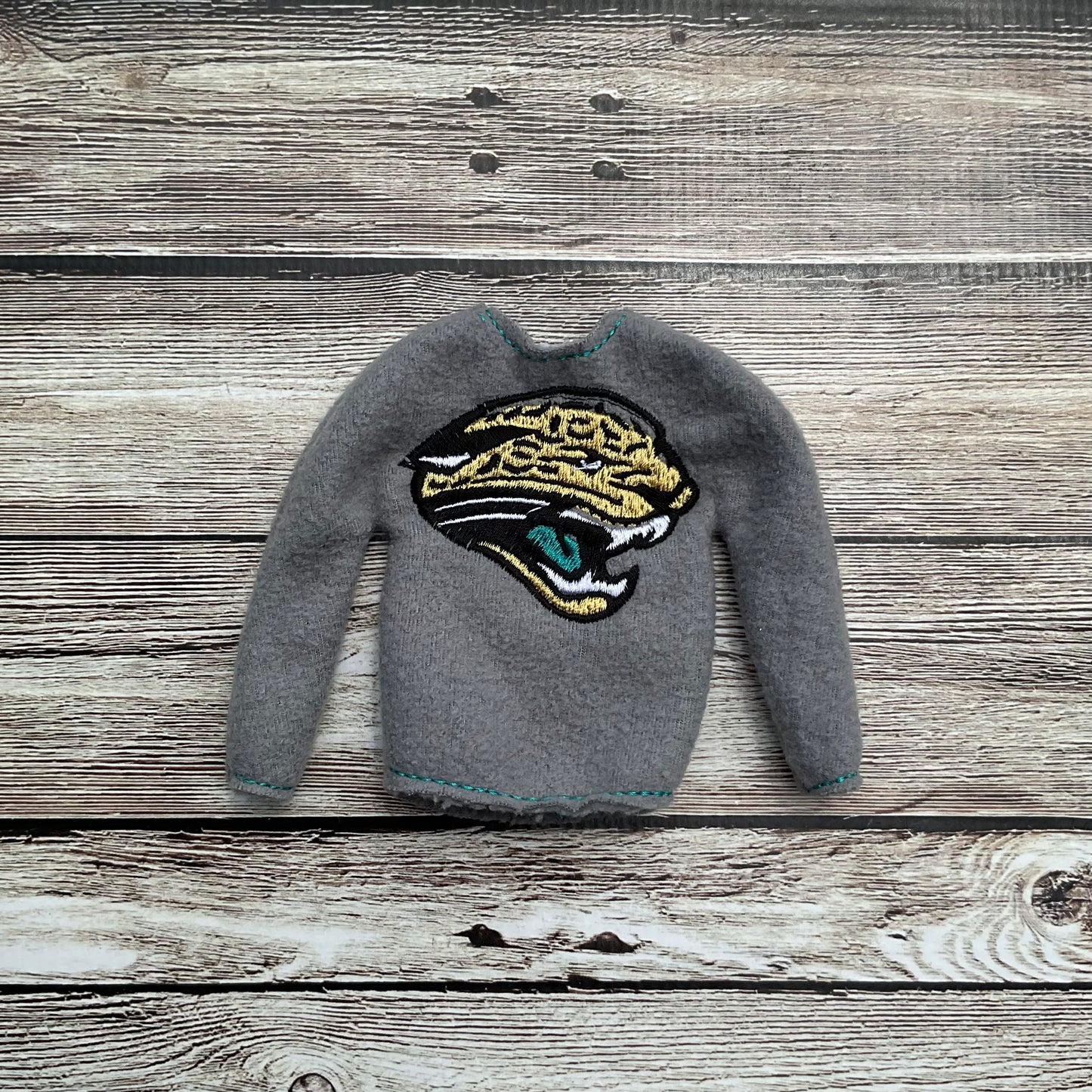 (303) Holiday Elf/Doll Sweater Jaguar Head
