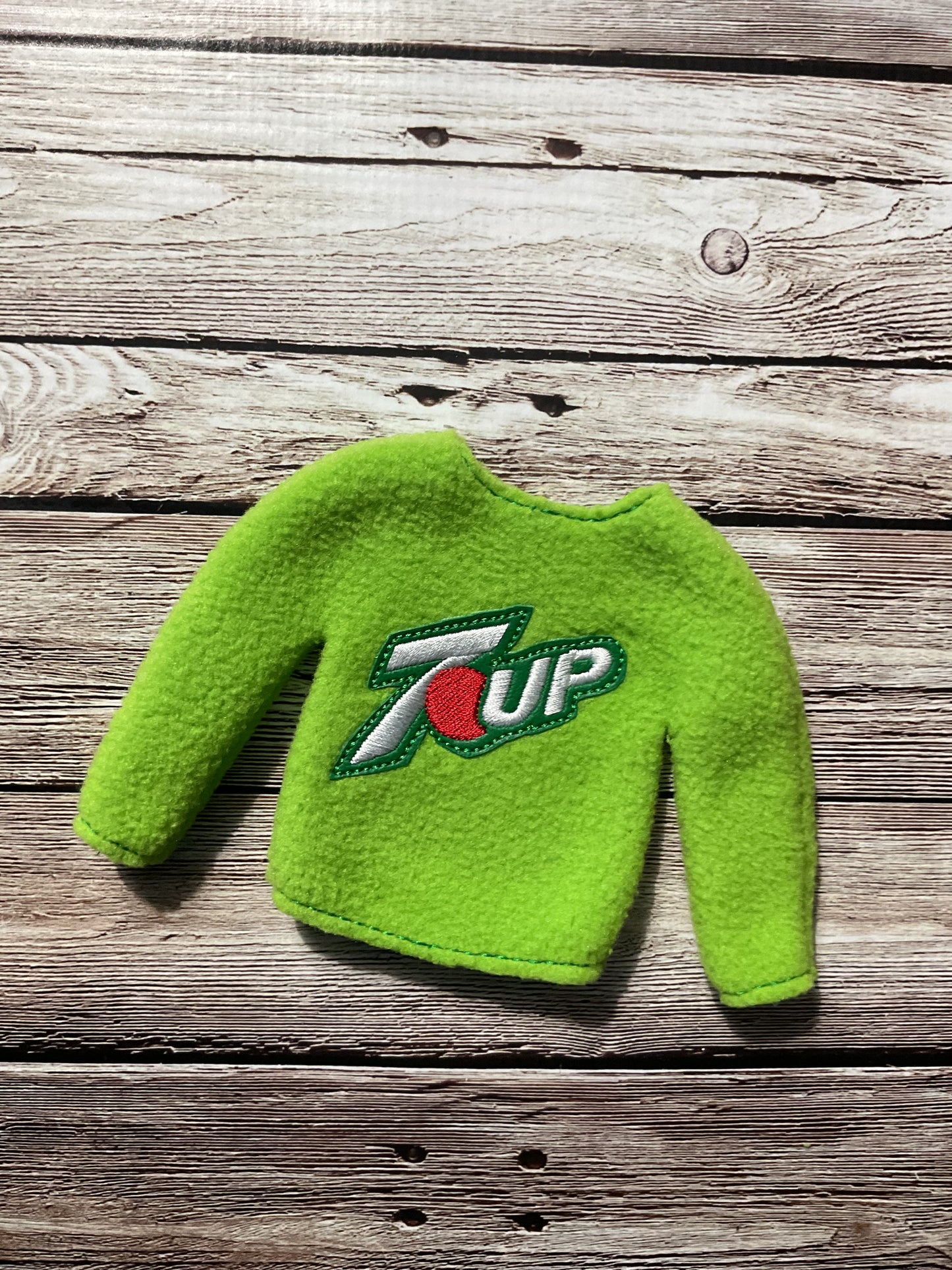 (280) Holiday Elf/Doll Sweater featuring refreshing 7-Up