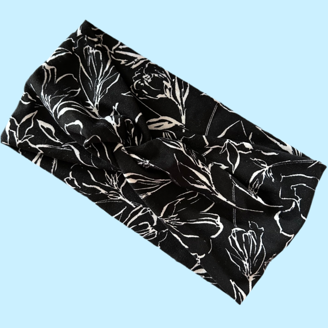 Wide hobo twisted black with subtle flowing flowers headband for sports, yoga, workouts, facials fashionable and comfortable