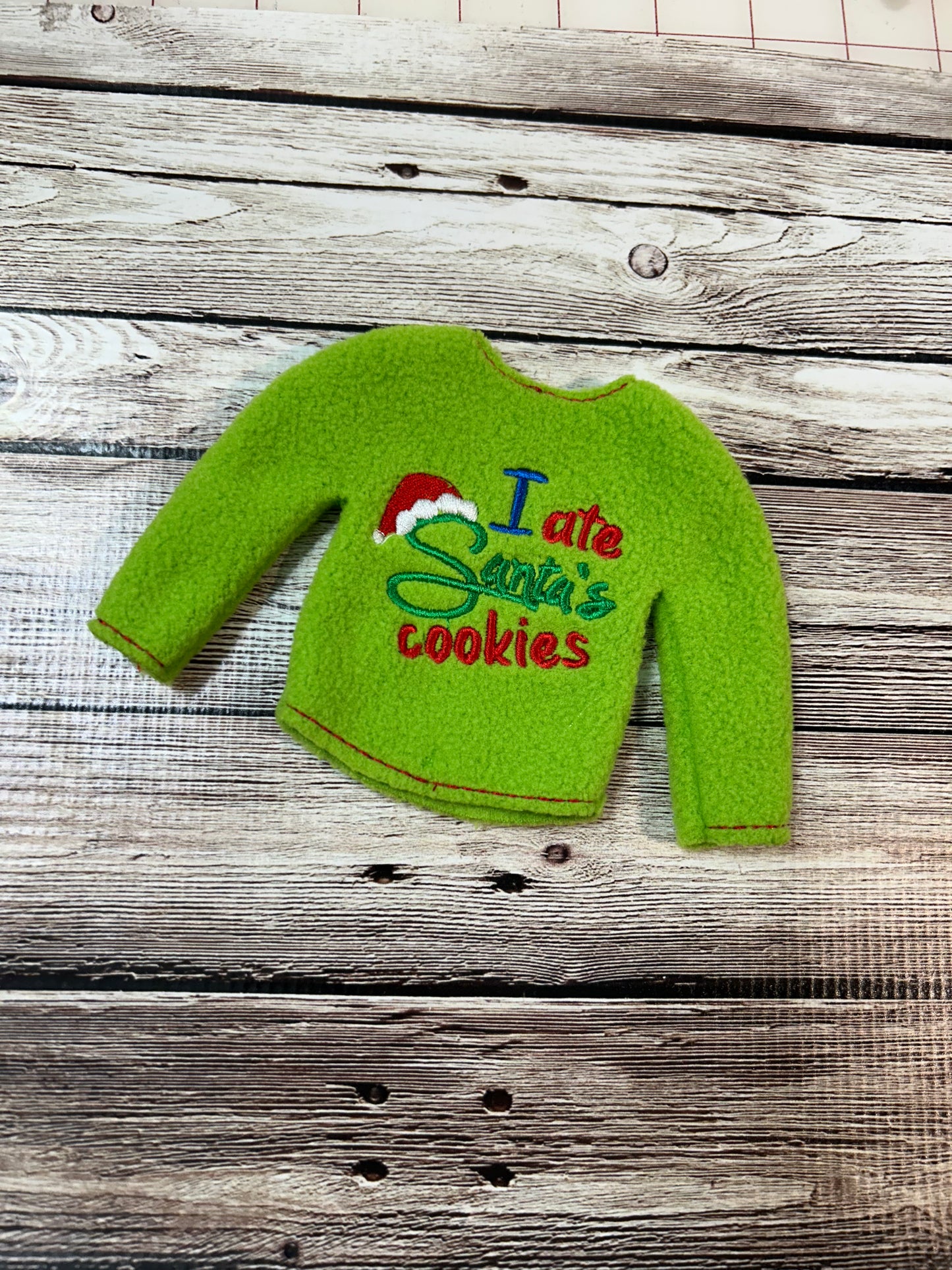 (290) Holiday Elf/Doll Sweater featuring” I Ate Santa’s Cookies”