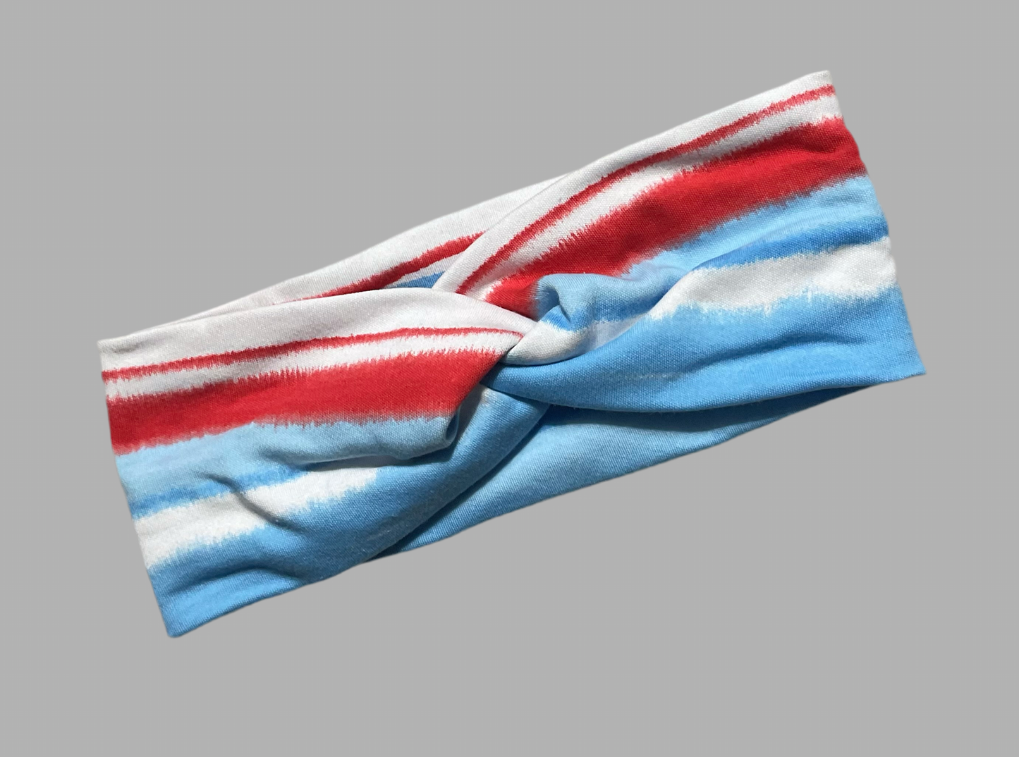 Wide twisted red, white and blue headband perfect for the Independence Day celebration, sports, yoga, workouts fashionable and comfortable