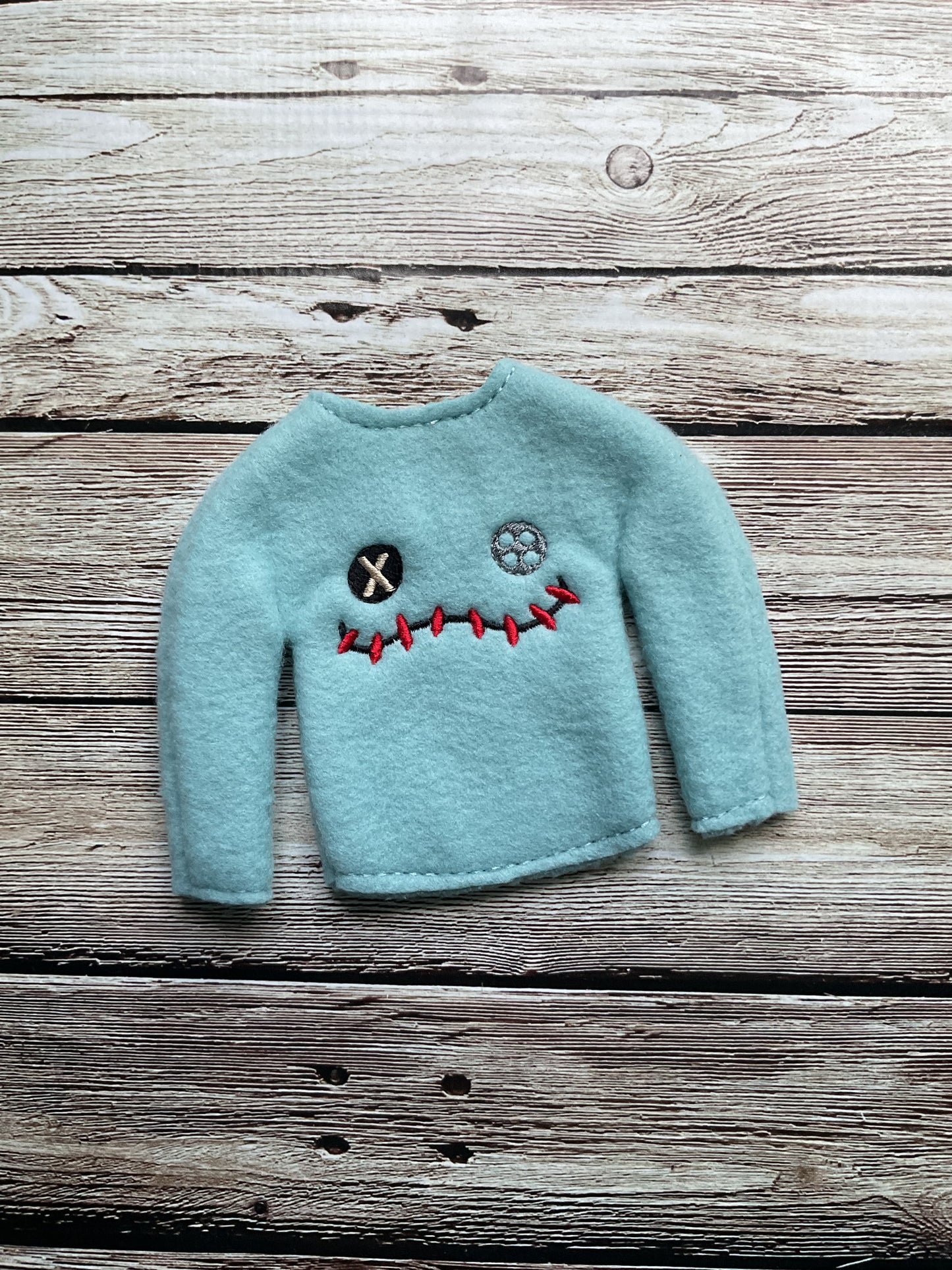 (138) Holiday Elf/Doll Sweater Alien Toy Face