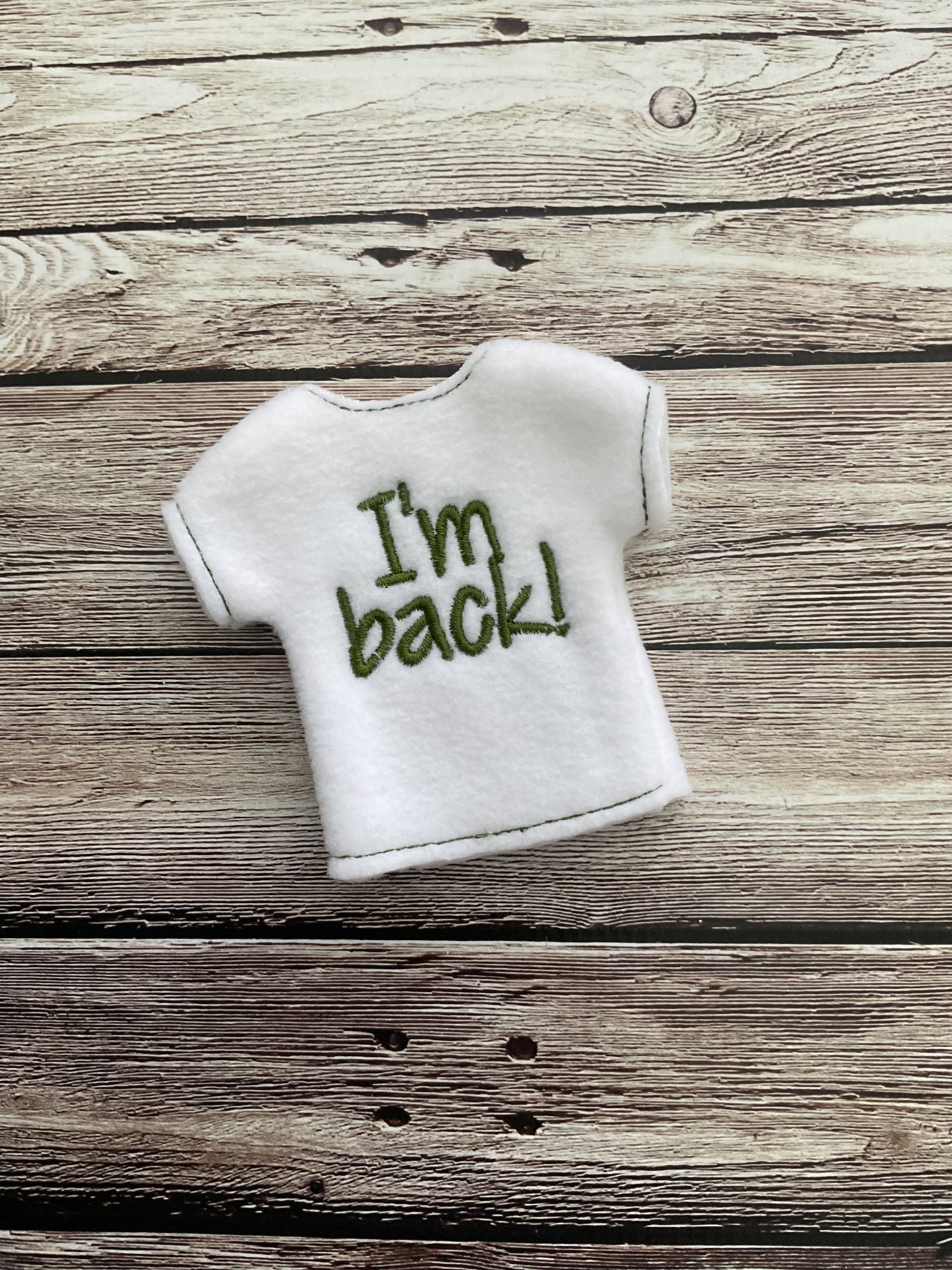 (123) Holiday Elf/Doll Sweater featuring a saying “I’m Back” Short Sleeve