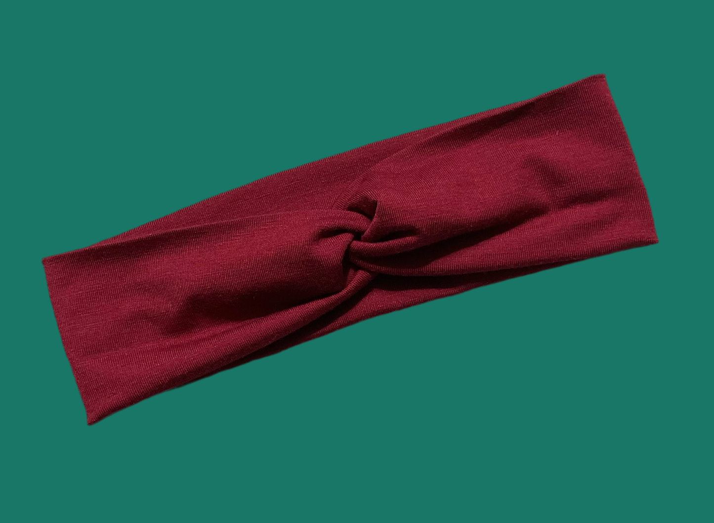 Wide twisted burgundy headband great for sports, yoga, workouts, facials fashionable and comfortable