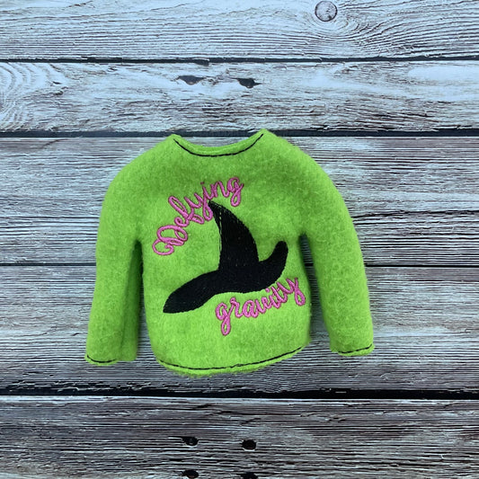 (266) Holiday Elf/Doll Sweater featuring a black Wicked Hat