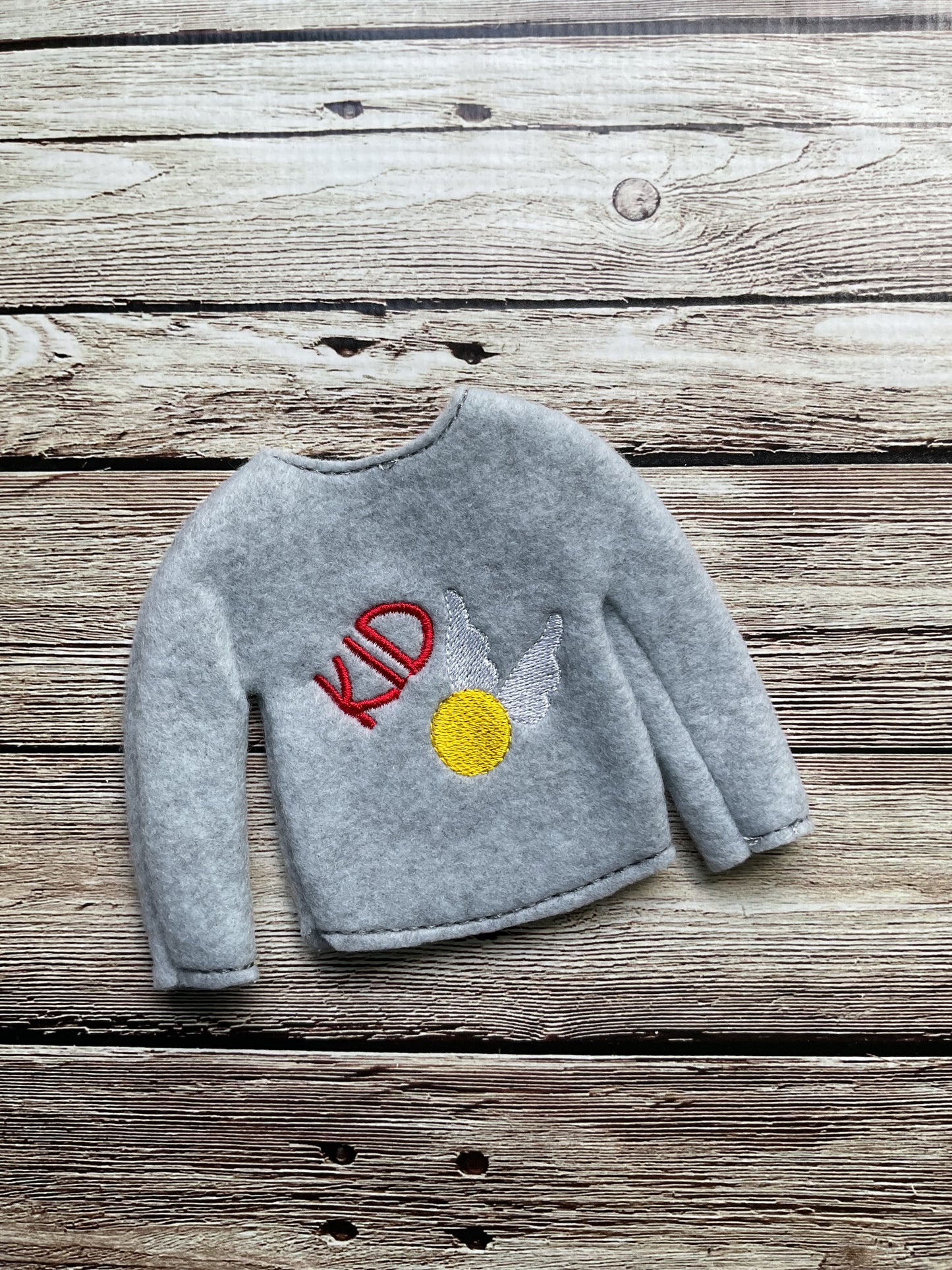 (147) Holiday Elf/Doll Sweater featuring Kid Wings