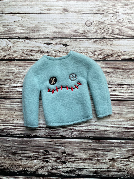 (138) Holiday Elf/Doll Sweater Alien Toy Face