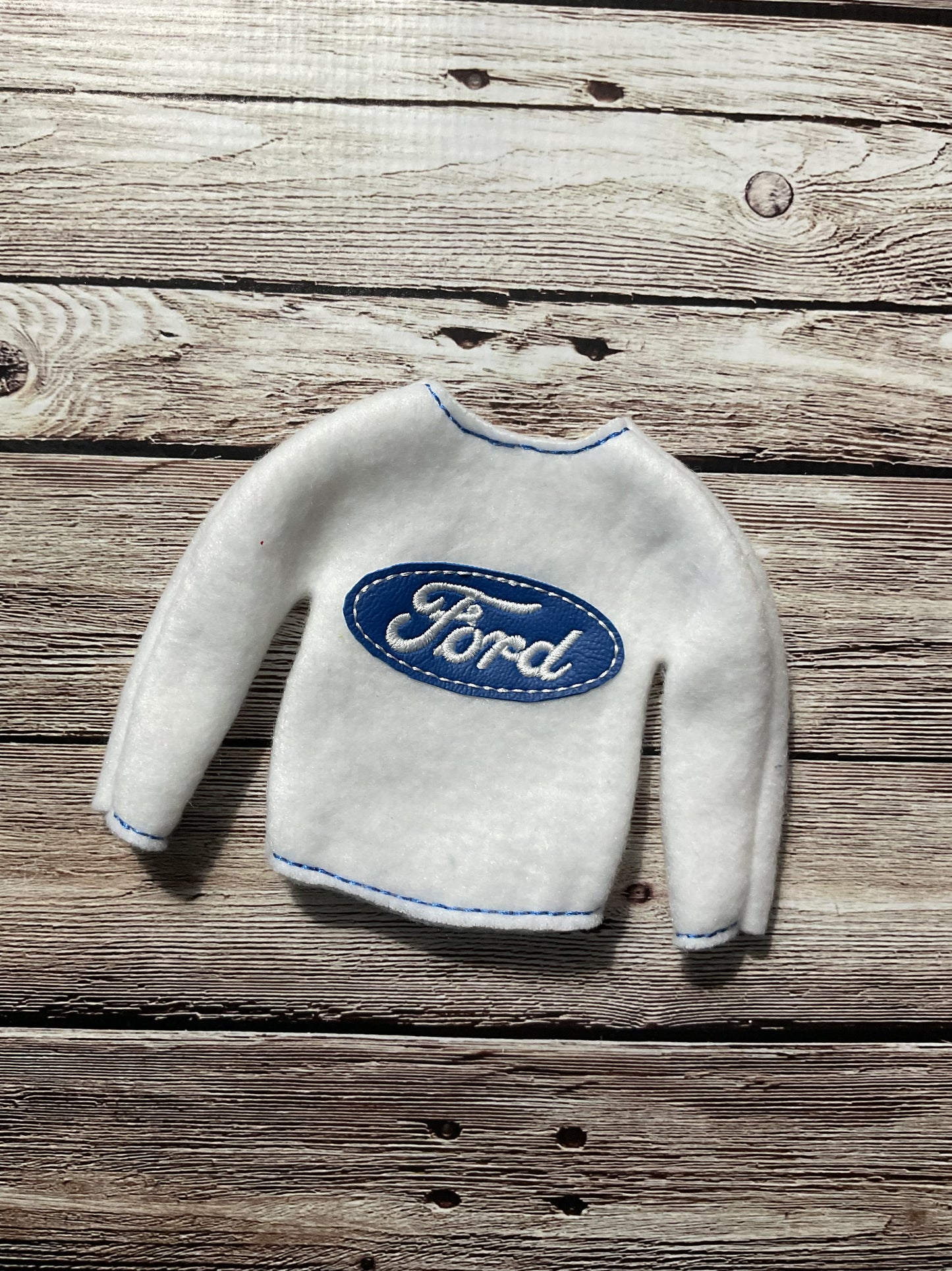 (244) Holiday Elf/Doll Sweater featuring a Ford design